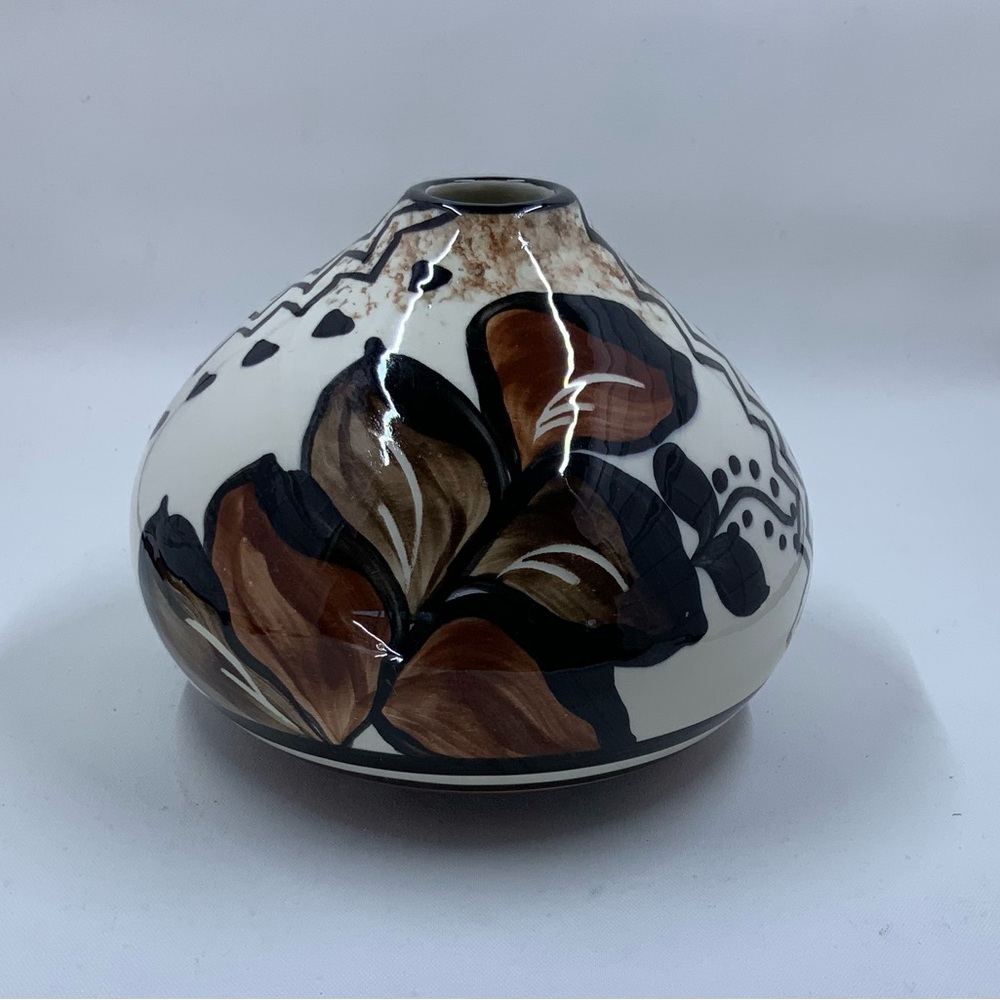 Hand painted pottery, signed by artist